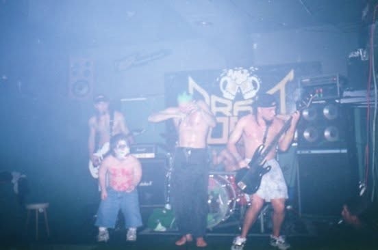 Live on tour: Mike Louis Polito on guitar, Matt the Pist Midget, Angst on vocals, Bezl on drums, and Migwell on bass